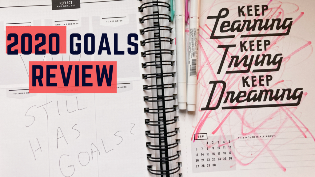 shows a notebook with red marks scratched all over it and the words "2020 goals review"